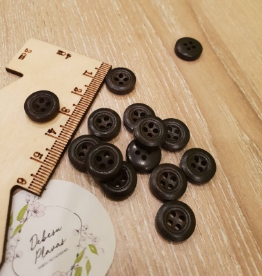 Small rosewood buttons