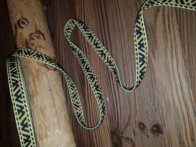 Decorative cotton trim ribbon with a wool symbol ''Jumis''