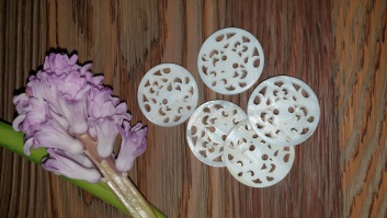 Large pearl buttons with laser engraved lace design